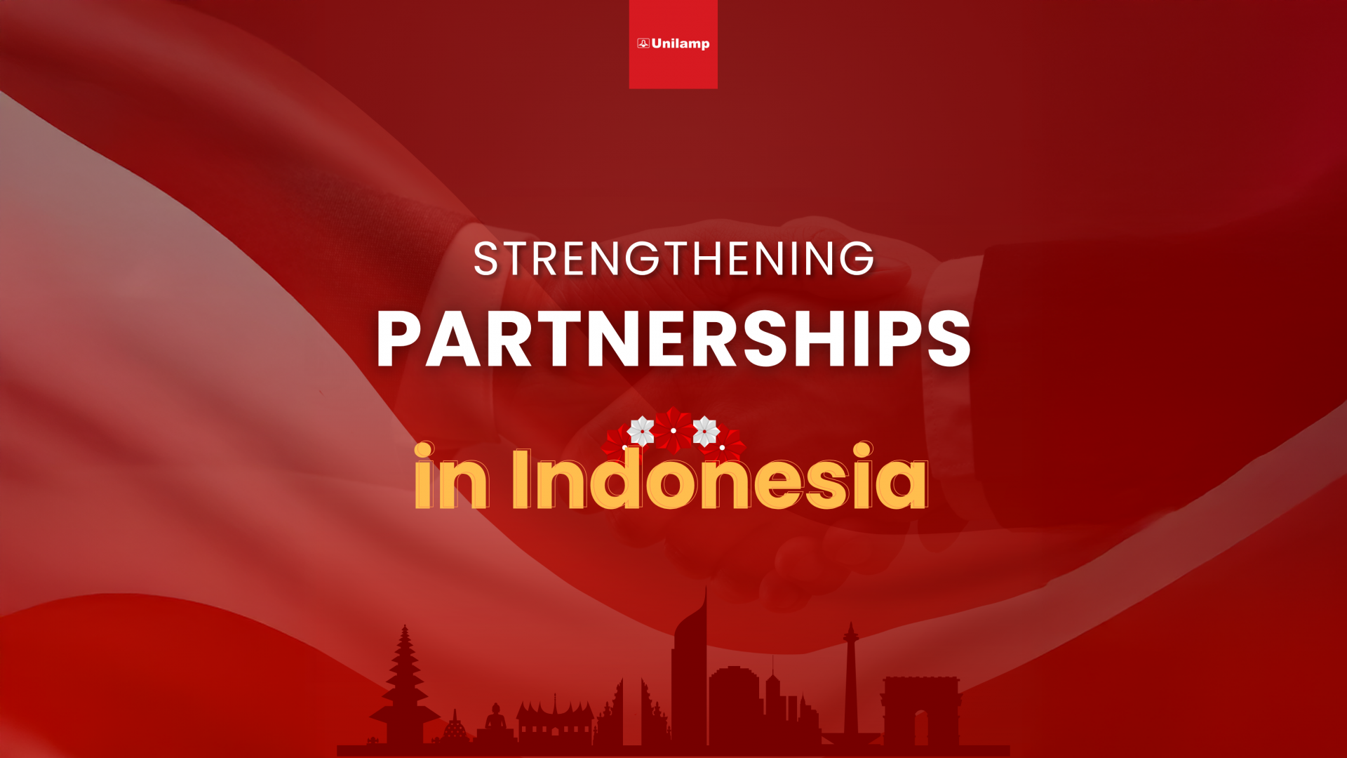 Unilamp strengthening partnerships in Indonesia with handshake and city skyline background.