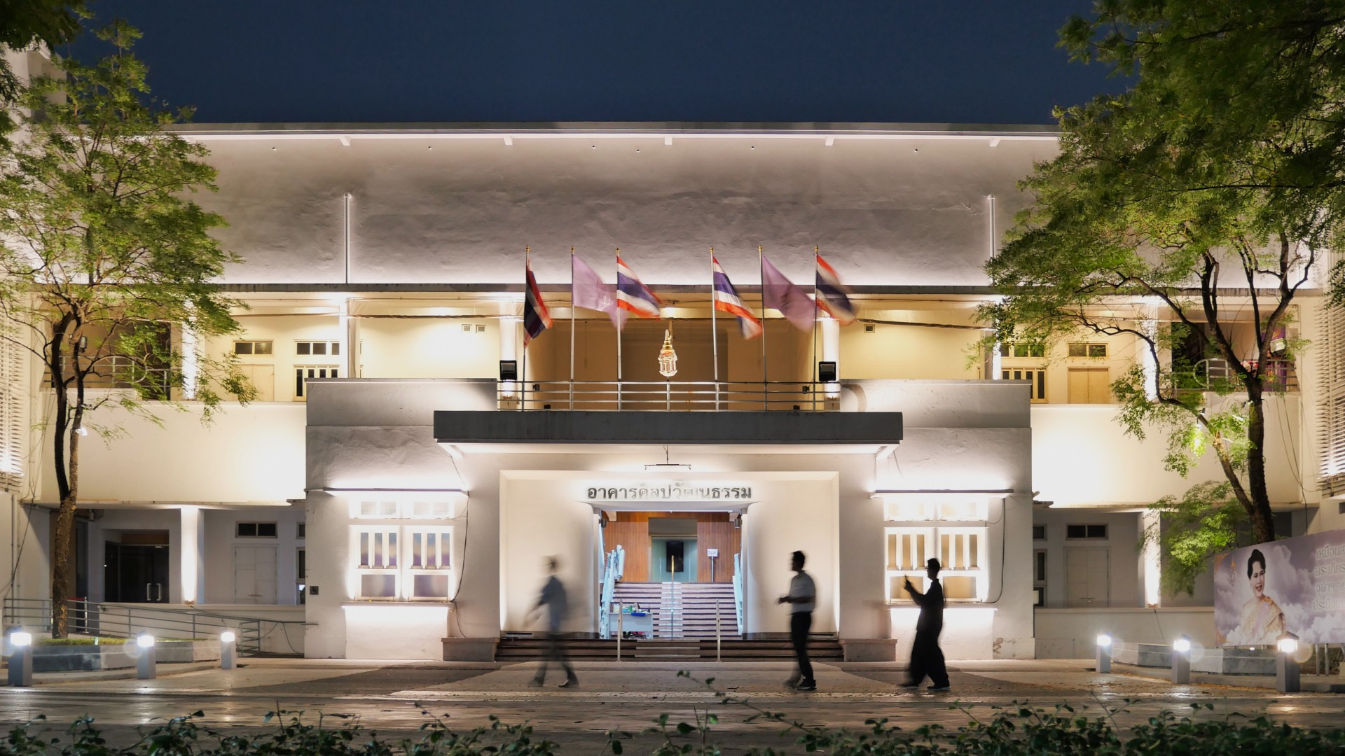 Chulalongkorn University building façade lighting at night with architectural uplighting