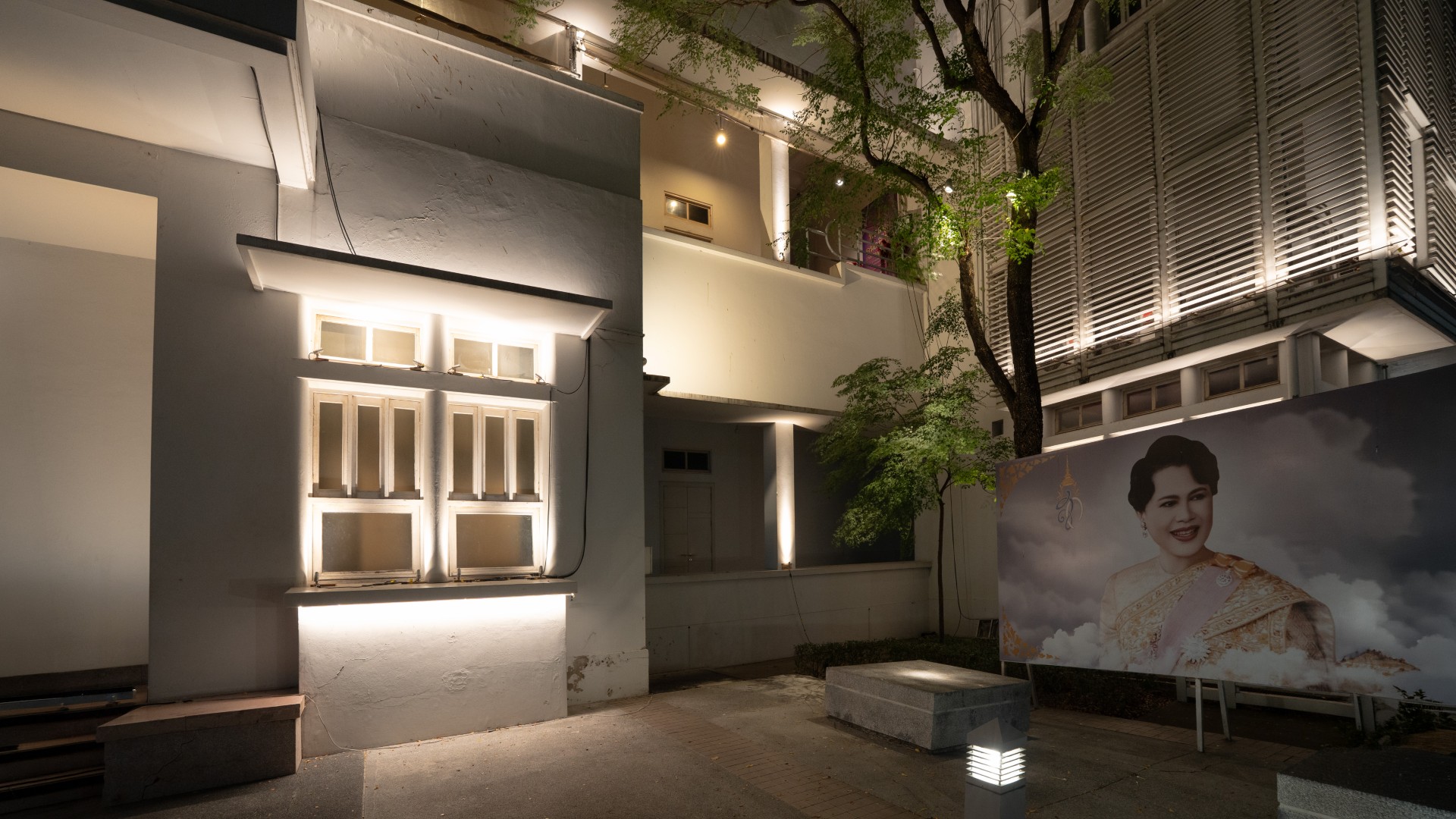 Window uplighting and landscape lighting at university campus at night