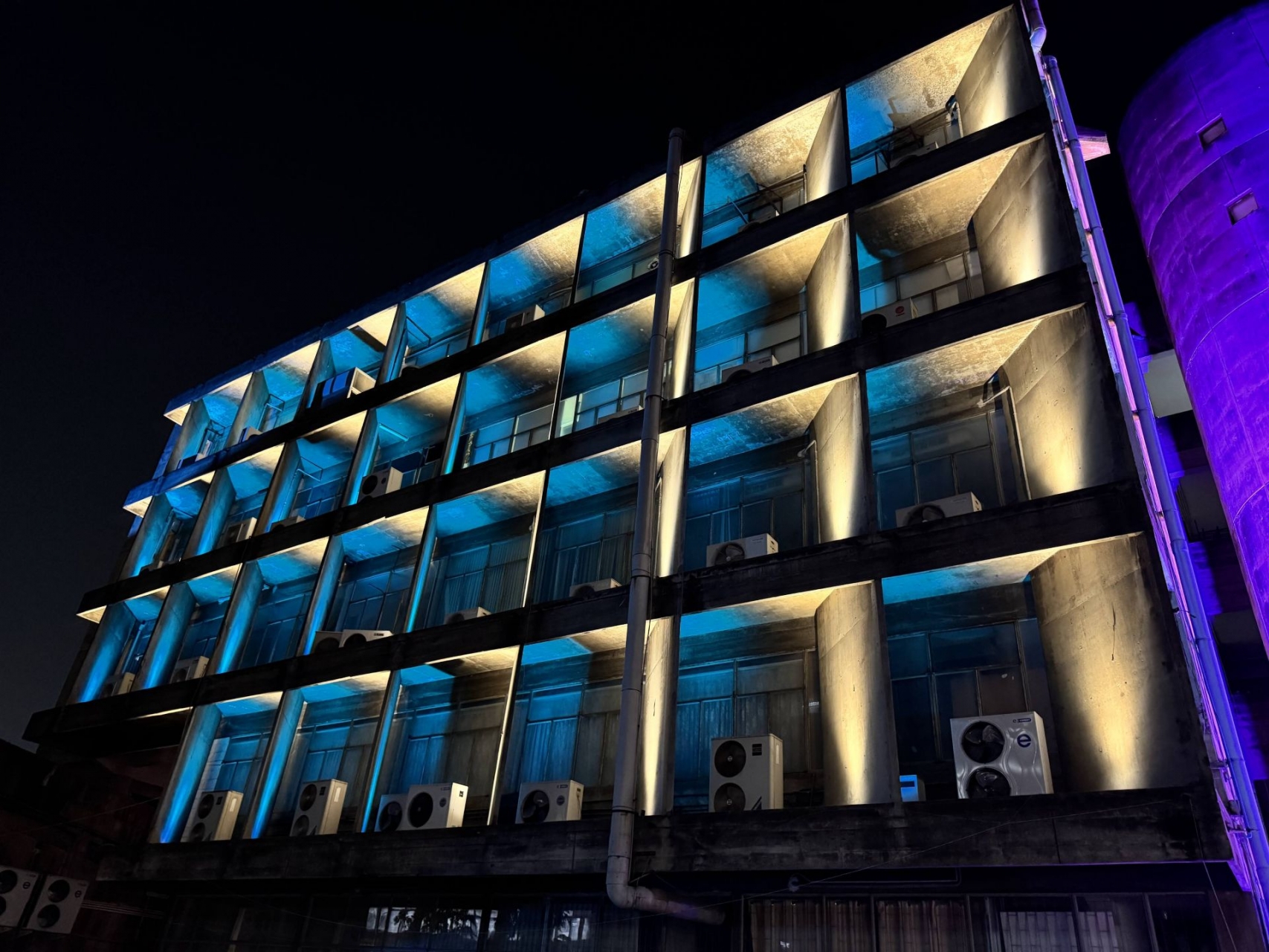 Kasetsart University facade lighting design with blue and warm light
