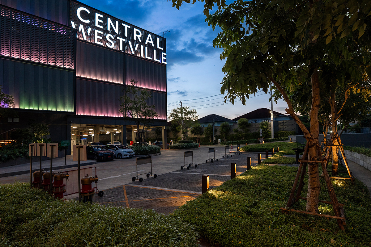 Central Westville exterior night with architectural facade lighting