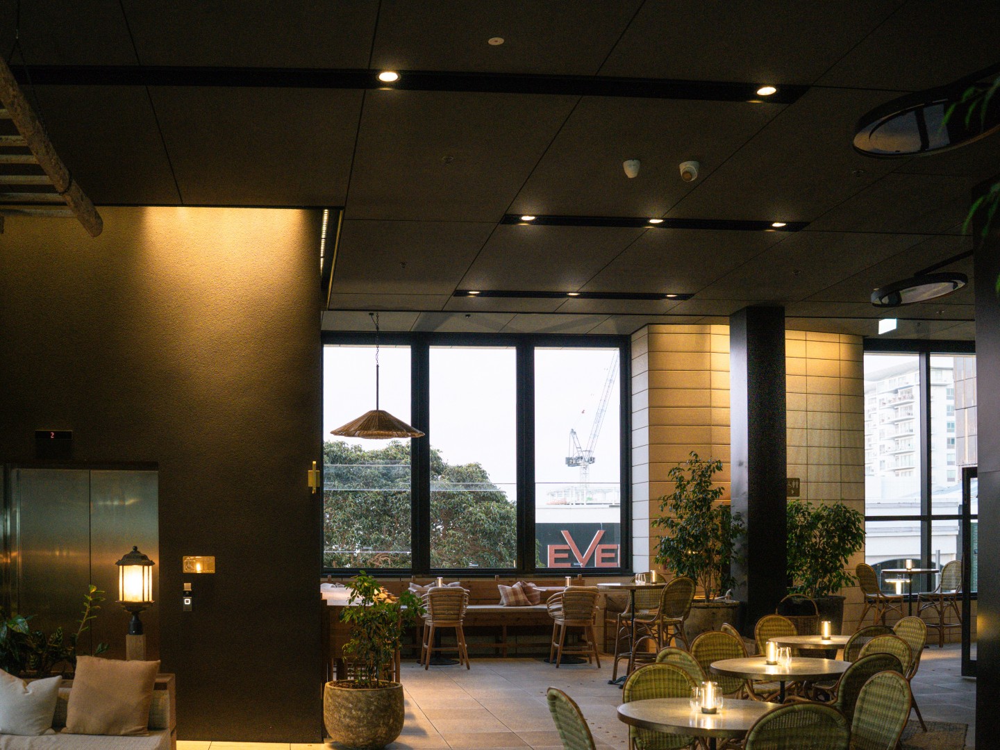 Unilamp architectural lighting creates warm ambience in modern commercial interior