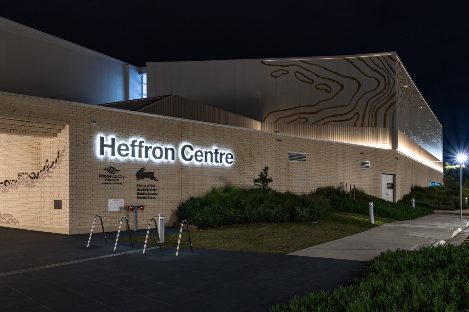 Heffron Centre facade lighting in Australia with illuminated architectural signage