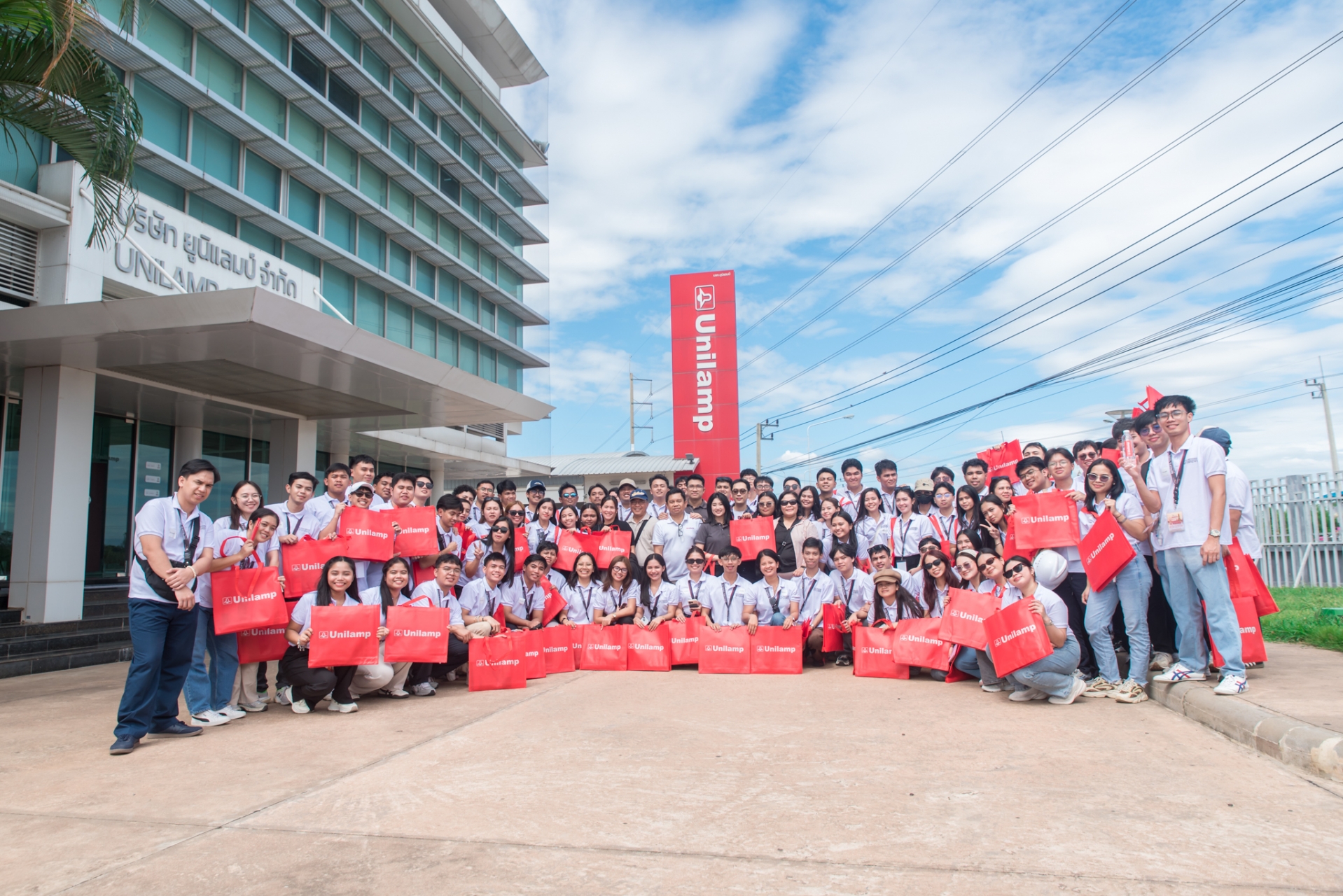 University of Mindanao engineering students visiting the Unilamp factory for an educational tour in Thailand.